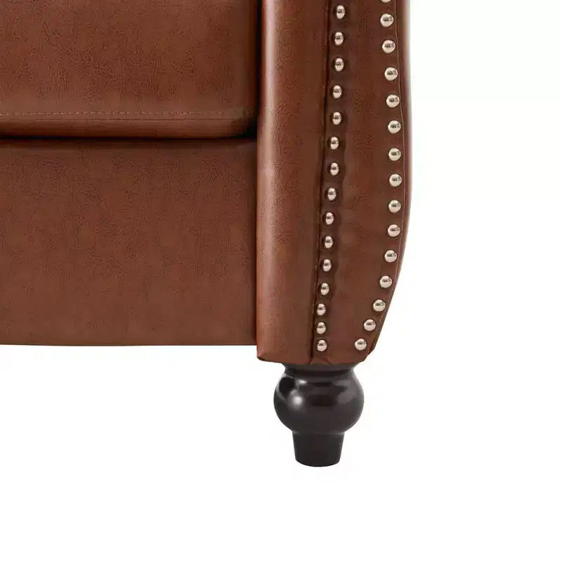 Fauteuil club Chesterfield moderne avec accoudoirs arrondis et clous décoratifs