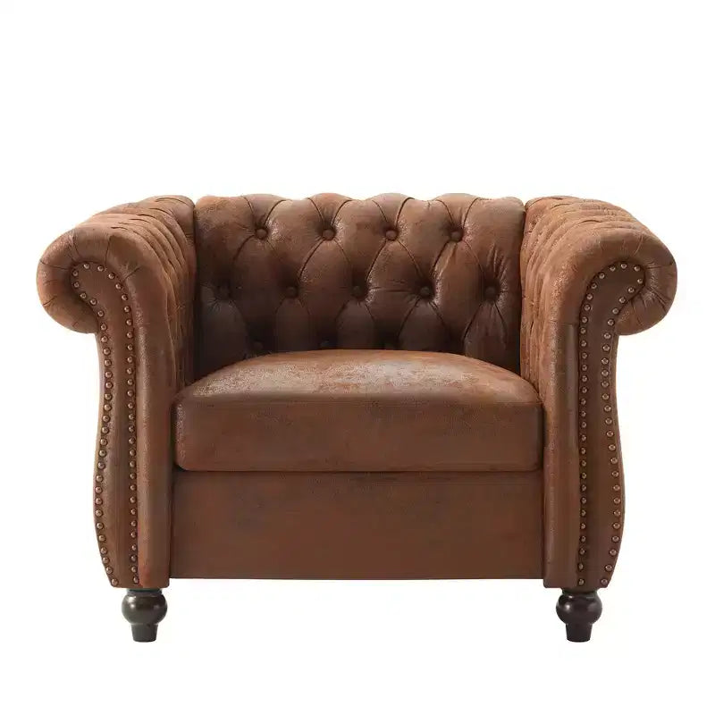 Fauteuil club Chesterfield moderne avec accoudoirs arrondis et clous décoratifs