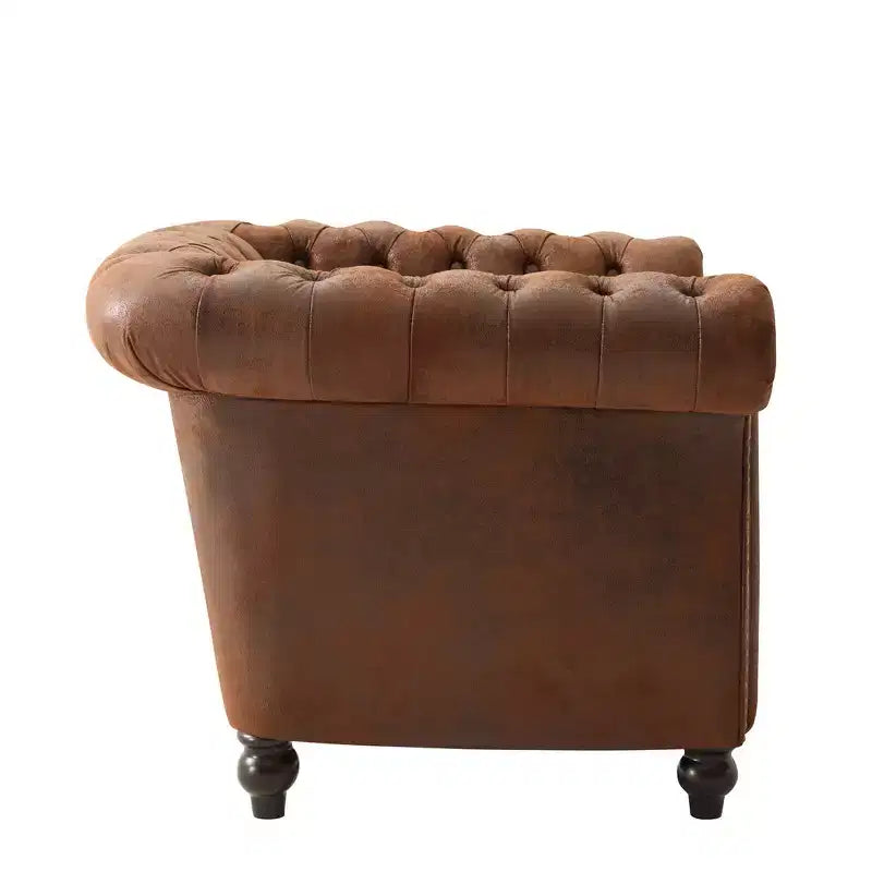 Fauteuil club Chesterfield moderne avec accoudoirs arrondis et clous décoratifs