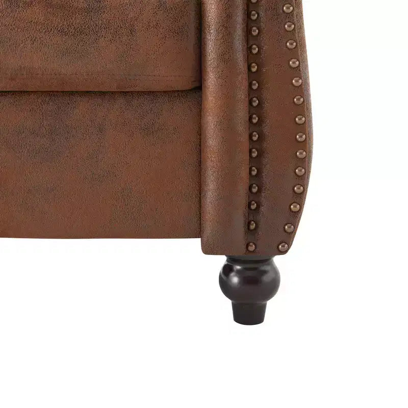 Fauteuil club Chesterfield moderne avec accoudoirs arrondis et clous décoratifs