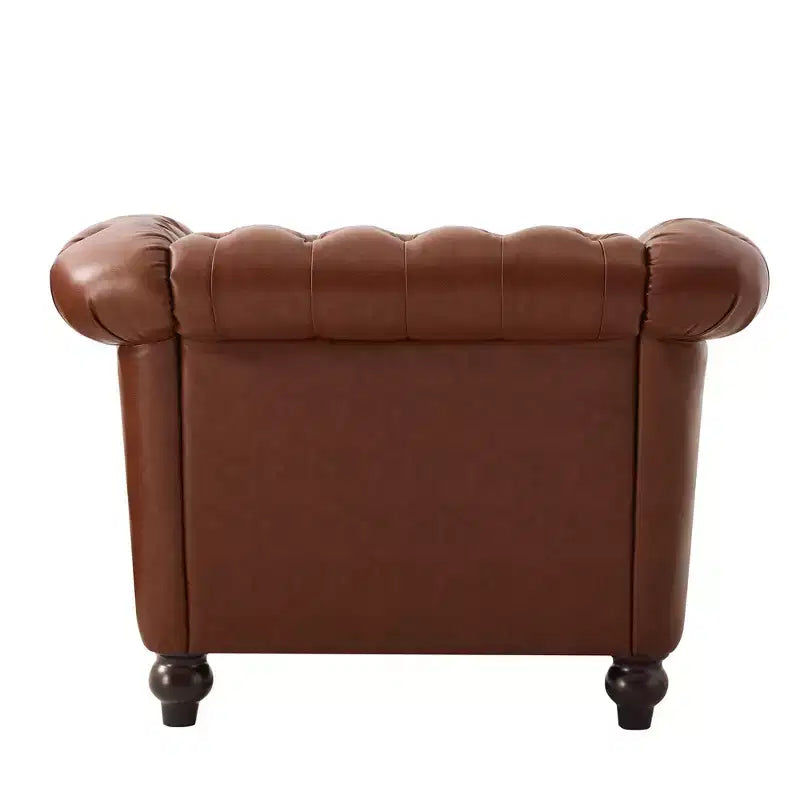 Fauteuil club Chesterfield moderne avec accoudoirs arrondis et clous décoratifs